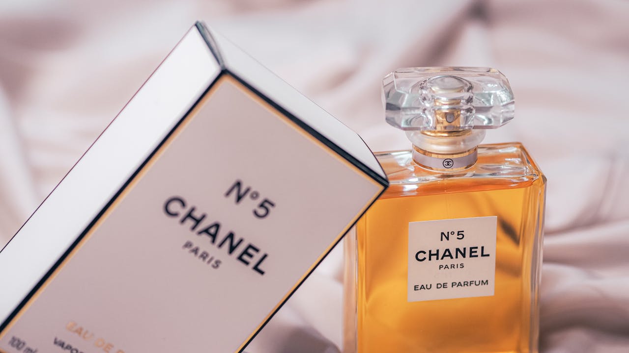 Mastering the First Impression: Your intriguing post title goes here Chanel No.5 Eau de Parfum bottle and box beautifully displayed in a soft setting.